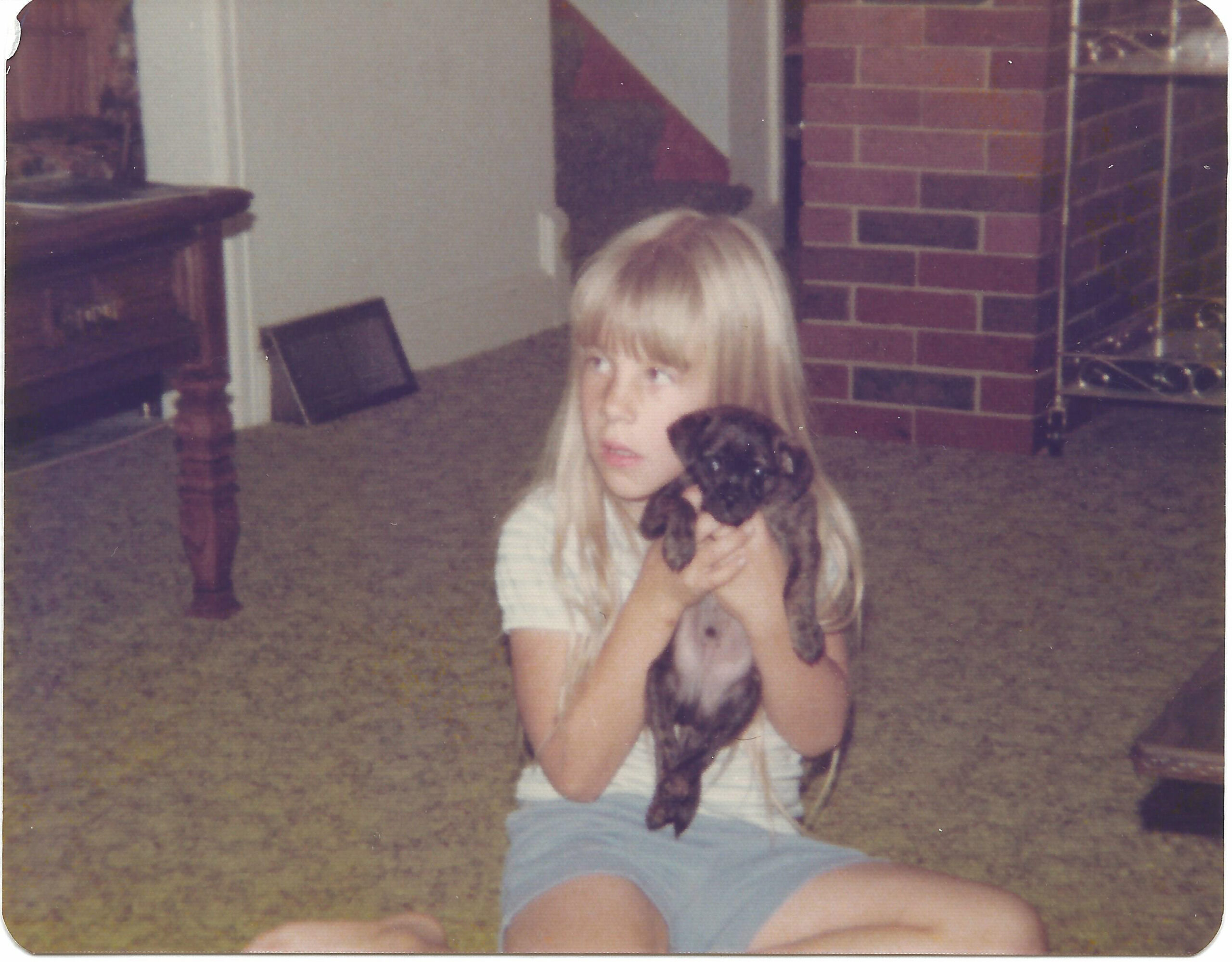 Young Shannon with puppy